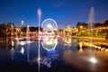 City of Nice ferris wheel and fountain evening mirror view Royalty Free Stock Photo