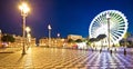 City of Nice giant ferris wheel and Massena square evening panoramic view