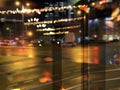 city night light  street reflection  car traffic buildings blurred light red yellow bokeh vew from window urban  holiday  li Royalty Free Stock Photo