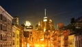 City night lights glowing against the downtown skyline buildings in Manhattan, New York City Royalty Free Stock Photo
