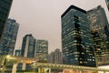 City night scene with business office skyscrapers in Hong Kong, Royalty Free Stock Photo