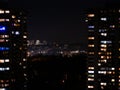 City night view. Eluminated windows of high-rise residential buildings