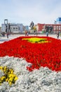 Lenin square with a blossoming flowerbed. Novosibirsk, Russia