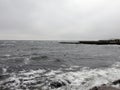 The city of Odessa. Ukraine. Coast near Fontana Street. Panorama of the stormy Black Sea in the feast of Epiphany.