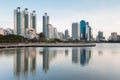 City office building with reflection over water lake Royalty Free Stock Photo