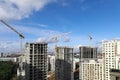 City panorama, construction site with cranes