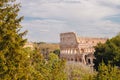 City panorama Rome, Italy Colosseum or Coliseum ancient ruins background blue sky stone arches and sunset Royalty Free Stock Photo