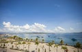 City park on the outskirts of Kamali Beach with traditional fishing boats in Baubau City, Indonesia.