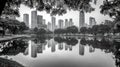 Urban Park Skyline Cityscape Reflection in Lake, Black and White Royalty Free Stock Photo