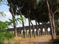 Ancient aqueduct in a park to Rome in Italy. Royalty Free Stock Photo