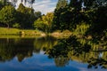 City park in the warm and sunny day during the autumn season. Landscape fulfilled of sunlight Royalty Free Stock Photo