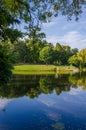 City park in the warm and sunny day during the autumn season. Landscape fulfilled of sunlight Royalty Free Stock Photo