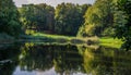 City park in the warm and sunny day during the autumn season. Landscape fulfilled of sunlight Royalty Free Stock Photo