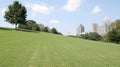 City Past Grassy Hill