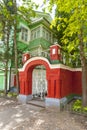 The city of Pechora. Russia. The Holy Dormition Pskov-Pechersk Monastery. The gate at the entrance to the garden, located next to