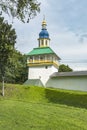 The city of Pechora. Russia. Petrovskaya passage tower in the fence of the Holy Dormition Pskov-Pechersk Monastery