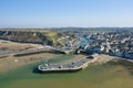 The city of Port en Bessin and the dikes of its port in Europe, France, Normandy, towards Omaha beach, in spring, on a sunny day Royalty Free Stock Photo