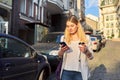 City portrait of young beautiful business woman walking down the street Royalty Free Stock Photo