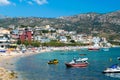 City public beach. Beautiful clean sand and pebble beach. Sunny blue seaside landscape. Himare, Albania