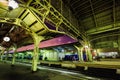 City railway station and passenger platform at night in St. Petersburg, Russia. Structure and roof of train station at twilight. Royalty Free Stock Photo