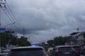 city rain with blur transport cars on road clouds up sky before rain.