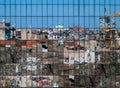 City reflections in new building glass