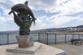 The city of Rethimno owes its name to this statue with the two dolphins, Crete, Greece Royalty Free Stock Photo