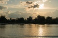 Yaroslavl, Russia, July 8, 2023. Sunset over the buildings at the water\'s edge.