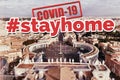 City of Rome and St. Peter`s Square with sign stayhome regarding Covid-19 pandemic