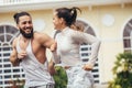 City running couple jogging outside. Runners training outdoors working out in Brooklyn with Manhattan, New York City in Royalty Free Stock Photo