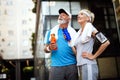 City running couple jogging outside. Senior couple runners training outdoors Royalty Free Stock Photo