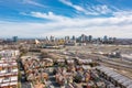 The city of Sacramento skyline with colorful buildings in the foreground and tower bridge seen in the distance