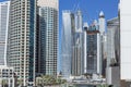 City scape with modern high-rise buildings and blue sky in background at Dubai Royalty Free Stock Photo