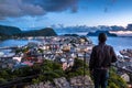 City Scene with A Lone Man Overlooking Alesund Center at Night Royalty Free Stock Photo