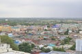 City scenery in Thailand Dense community with fields, looking from high angles, sky,