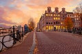 City scenic from Amsterdam at the Amstel in the Netherlands at sunset Royalty Free Stock Photo