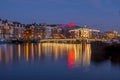 City scenic from Amsterdam at the river Amstel in the Netherlands at night Royalty Free Stock Photo