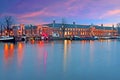 City scenic at the river Amstel Amsterdam at sunset Royalty Free Stock Photo