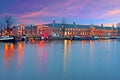 City scenic at the river Amstel Amsterdam at sunset