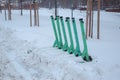 City scooters covered with snow