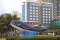 A city sculpture of a whale against the background of modern hotels, Vung Tau, Vietnam