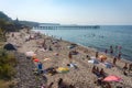 City sea beach. Baltic Sea. A lot of people at the seaside resort. Pionersky Neukuhren