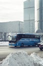 City-Shuttle blue bus on the street near Moscow International Business Center. Moskva-Siti district at winter. fast and convenient Royalty Free Stock Photo