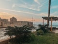 The city of Sidon in Lebanon. Sidon Sea Castle, built by the crusaders - Saida corniche and building. Sidon sea at sunset Royalty Free Stock Photo