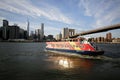 City Sightseeing boat under Brooklyn Bridge