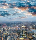 City skyline along river Thames at night, aerial view - London - Royalty Free Stock Photo