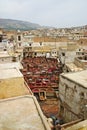 City skyline and dye pots at one of the tanneries in the ancient Royalty Free Stock Photo