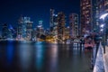 City skyscrapers on seafront in night Royalty Free Stock Photo