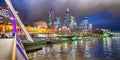 City skyscrapers and Yarra river at night from Southbank Footbridge, Melbourne. Royalty Free Stock Photo