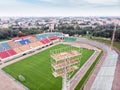 city sports stadium. football field and grandstands with colorful seats Royalty Free Stock Photo